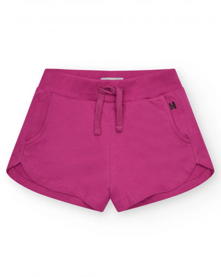 Short pour fille en fuchsia avec taille élastique et poches.