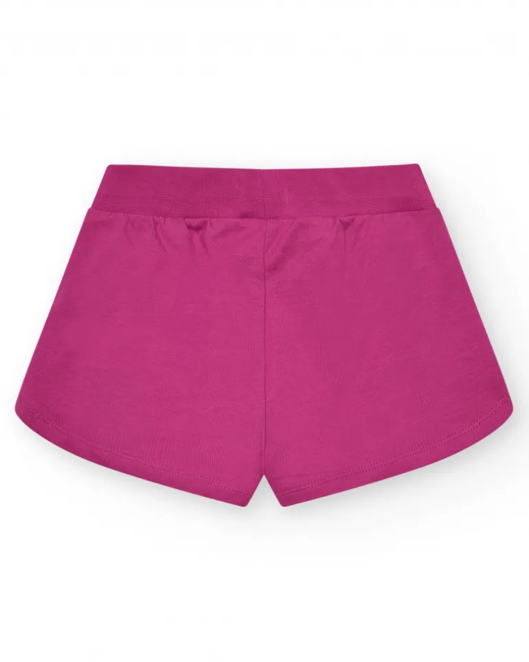 Short pour fille en fuchsia avec taille élastique et poches.