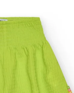 Short pour fille en jaune avec taille élastique.