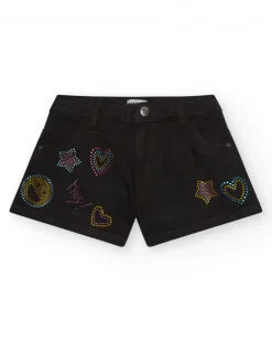 Short pour fille en noir décoré avec des clous colorés.