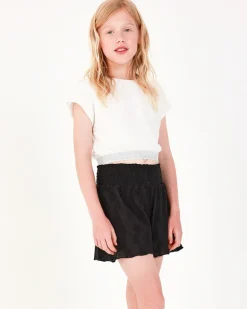 Short pour fille en noir avec taille élastique et imprimé floral.