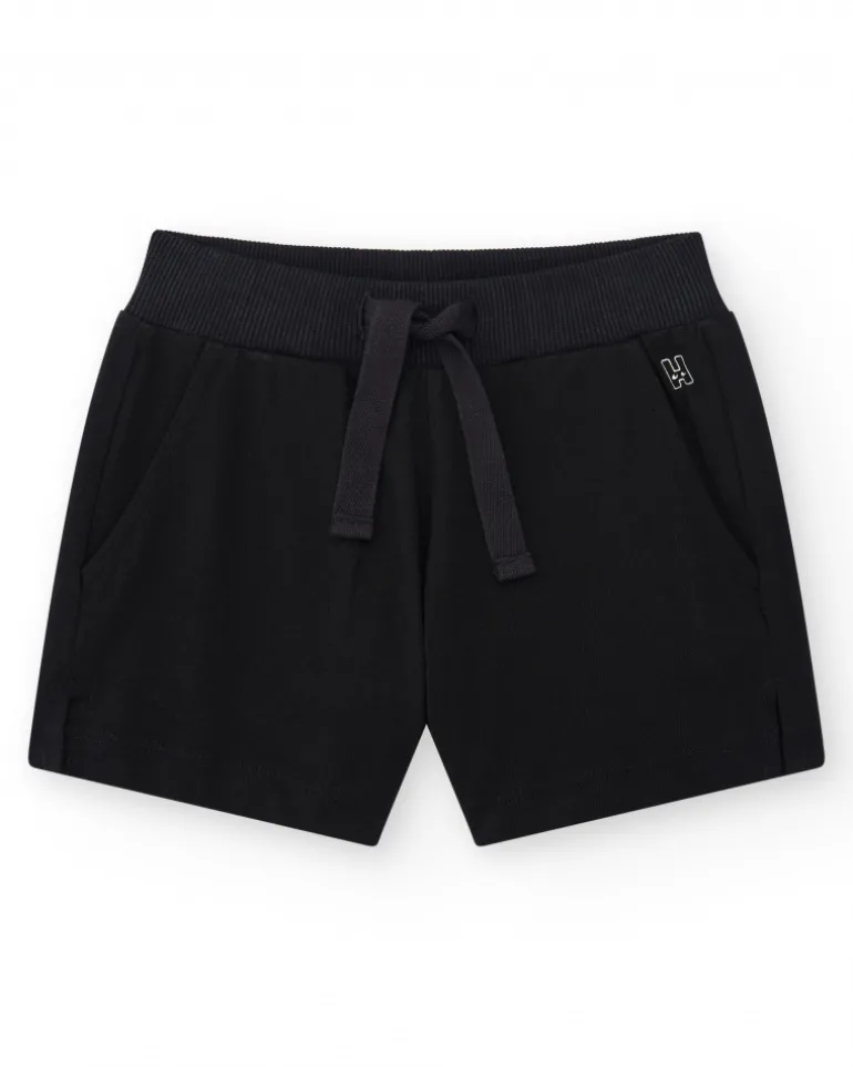 Short pour fille en noir avec taille élastique et poches.