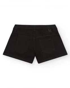 Short pour fille en noir décoré avec des clous colorés.