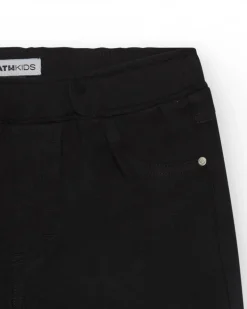 Short pour fille en noir avec taille élastique et poches.