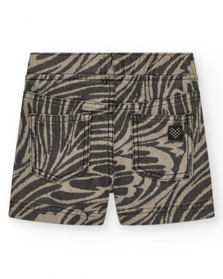 Short pour fille en vert avec poches et taille élastique.