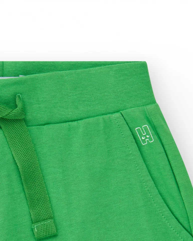 Short pour fille en vert avec taille élastique et poches.