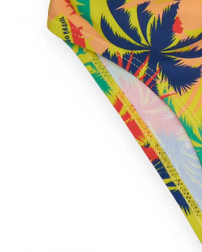 Slip de bain multicolore pour garçon avec imprimé tropical et cordon contrastant.