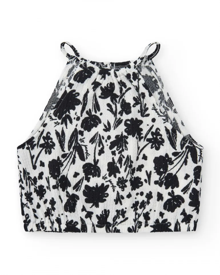Top pour fille en blanc avec bretelles et imprimé floral.
