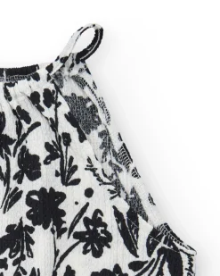 Top pour fille en blanc avec bretelles et imprimé floral.
