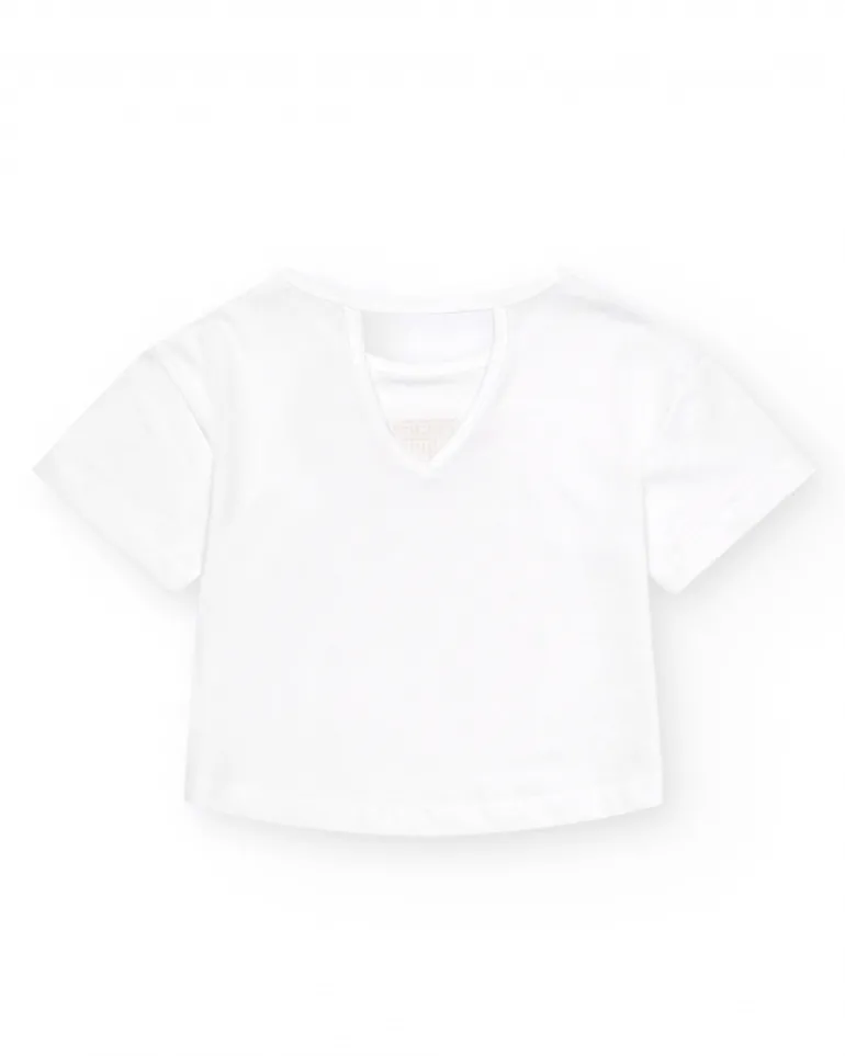 T-shirt pour fille en blanc avec imprimé sur le devant en rose et violet.