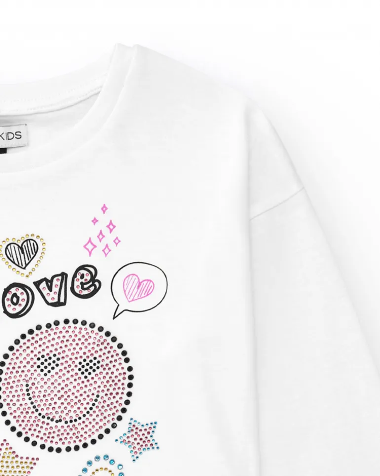T-shirt pour fille en blanc, à manches longues, décoré avec des graphiques.