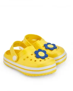 Zuecos para niña en amarillo con flor decorativa